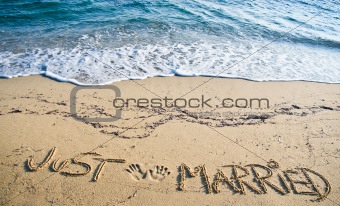 Just Married written in the Sand