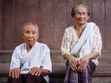 Portrait of two senior asian women looking at camera