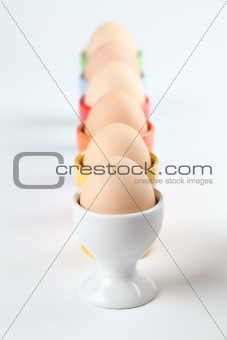 Eggcups with eggs