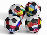 Four isolated soccer balls with flags of european countries.