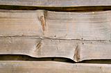 Wooden village house wall carved planks background 