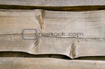 Wooden village house wall carved planks background 