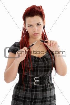 Young serious woman with pen 