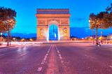 Evening traffic on Champs-Elysees in front of Arc de Triomphe (P