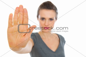 Business woman showing stop gesture