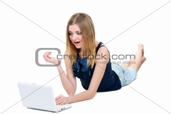 Beautiful young girl with laptop on white background