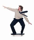 Businessman on skateboard - isolated