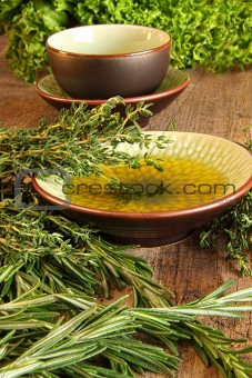 Fresh herbs on wooden cutting board 