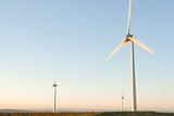 Three Wind Turbines at Dawn, UK.