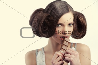 vintage style girl eating chocolate