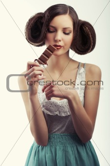 girl melting chocolate on her lips