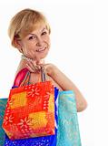 Pretty mature lady carrying shopping bags