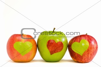 three apples with hearts
