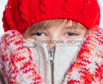 Portrait of young beautiful boy in winter style