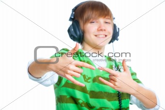 portrait of a male teenager listening to music