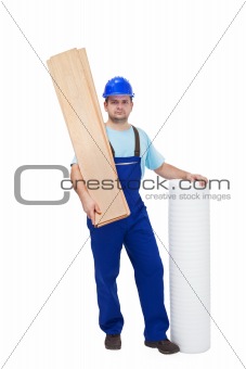 Worker with flooring materials