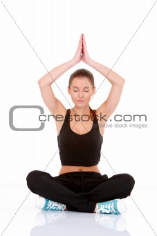 Portrait of pretty young woman doing yoga