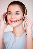 Young attractive business woman with headset