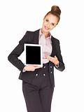 Young business woman showing tablet screen