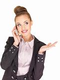 Pretty female businesswoman talking mobile phone