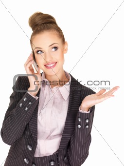 Pretty female businesswoman talking mobile phone