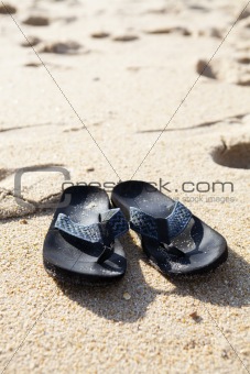 Flip flops in sand