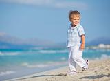 Little cute boy on the beach