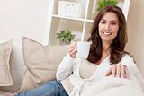 Woman Drinking Tea or Coffee at Home