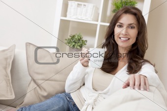 Woman Drinking Tea or Coffee at Home