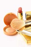 gold make up collection on white background