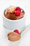 Chocolate mousse dessert with a spoon