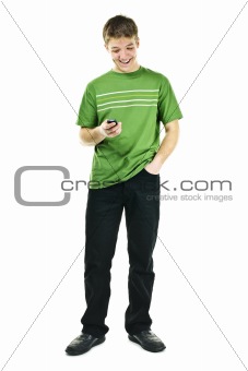 Smiling young man holding cell phone