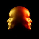 Two-faced head statue, red and gold
