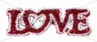 The Word Love Shaped White and Red Tinsel on a White Background.