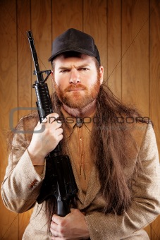 Southern Hick with a rifle and flowing hair