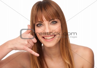 Beauty portrait of a cute girl gesturing a phone call - call me