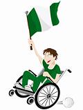 Nigeria Sport Fan Supporter on Wheelchair with Flag
