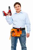 Smiling construction worker with electric screwdriver