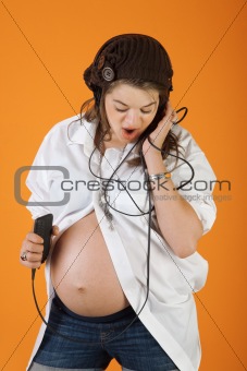 Pregnant Woman With Music