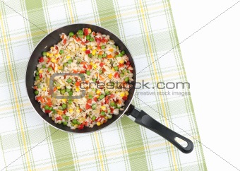Rice with mix vegetables in a pan