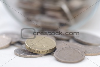 Spilled Coins from Glass Jar