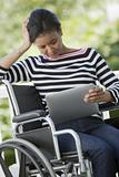 Disabled woman with Digital Tablet