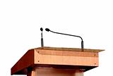 Seminar podium and microphones over white