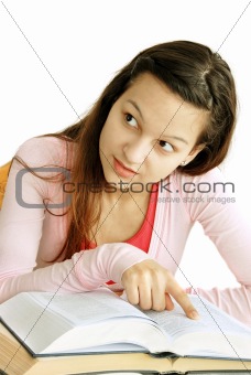 Teenage girl reading a book