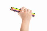 Colorful pencils in hand