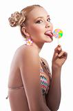 blond girl licking candy