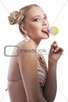 blond girl licking candy