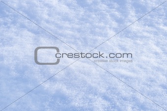Detail of snow texture with shadows - background