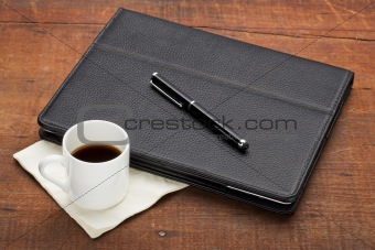 tablet computer with coffee