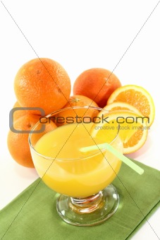 fresh orange juice with orange halves